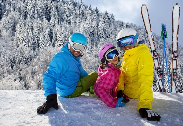 Family on winter sports ski holiday