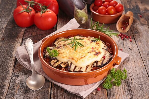 Moussaka dish on wooden table