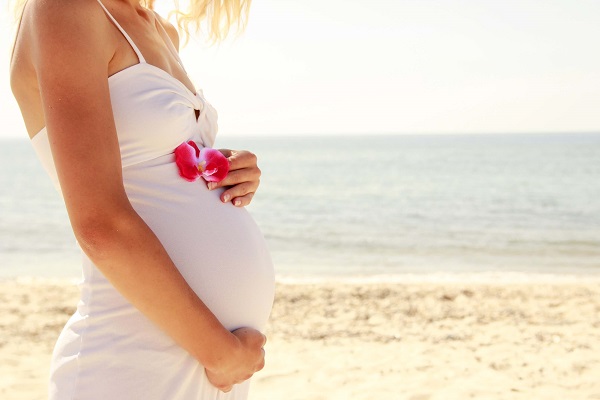 Pregnant lady on beach