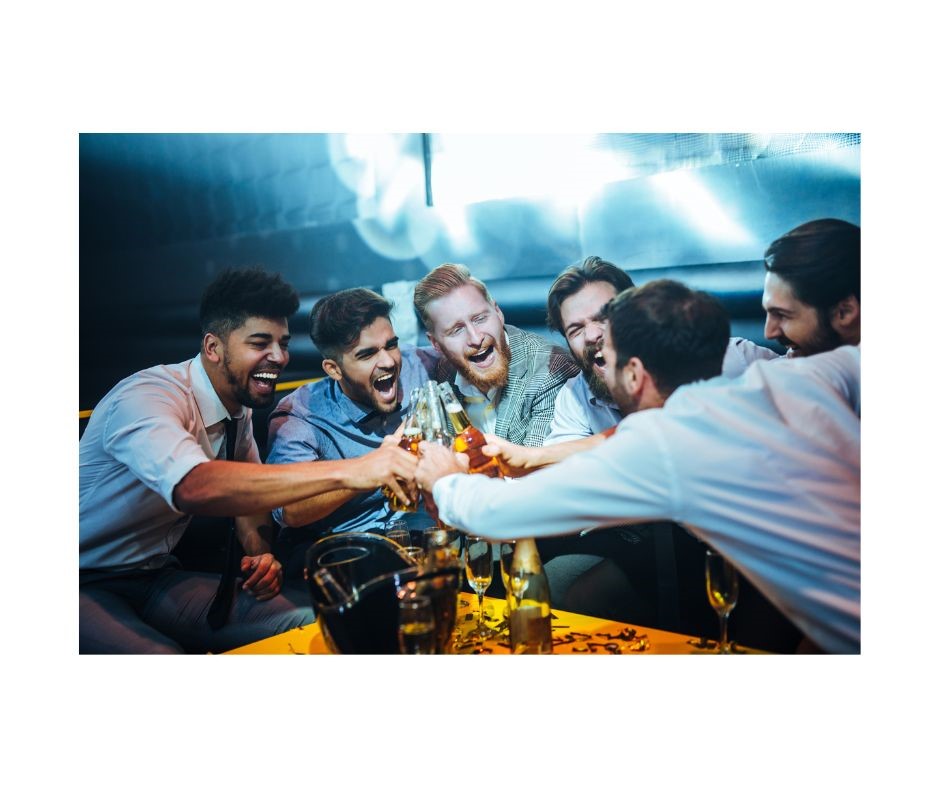 Stag do of friends cheering their beers